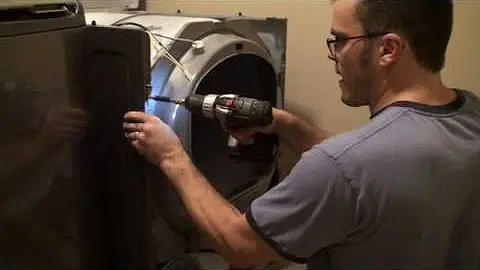 Electric dryer repair technician servicing an electric dryer in Philadelphia PA