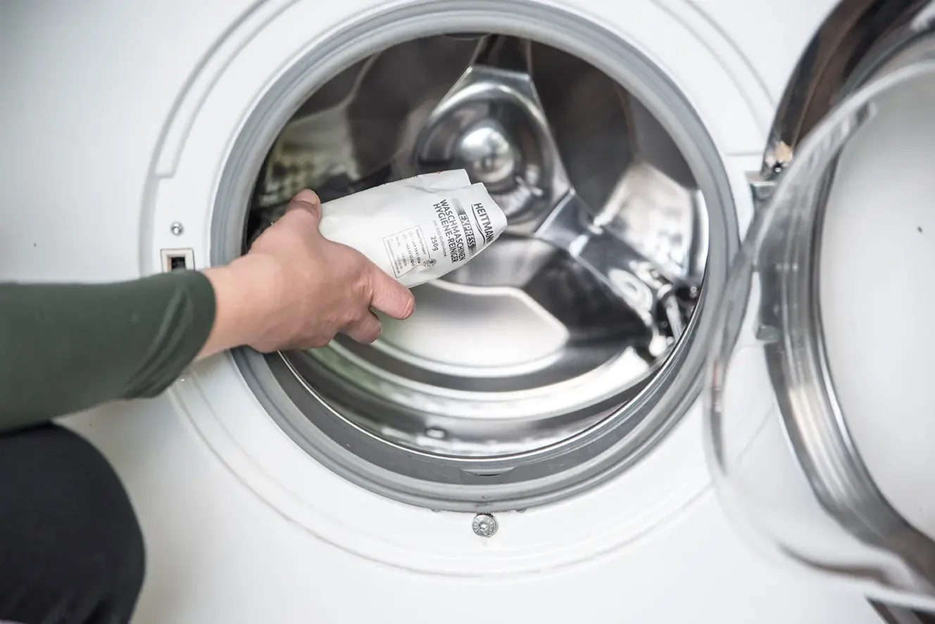 Local dryer repair technician inspecting a dryer in Philadelphia PA