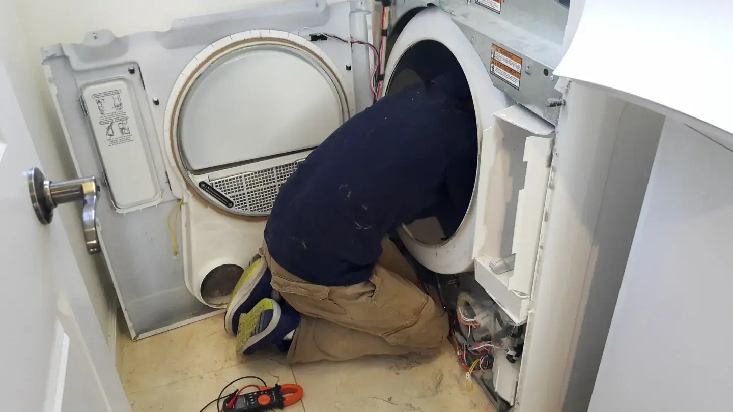 Same-day dryer repair technician checking a dryer in Philadelphia PA