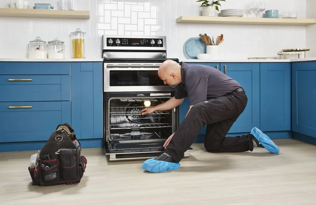 Appliance repair technician servicing a Philadelphia home or rental property