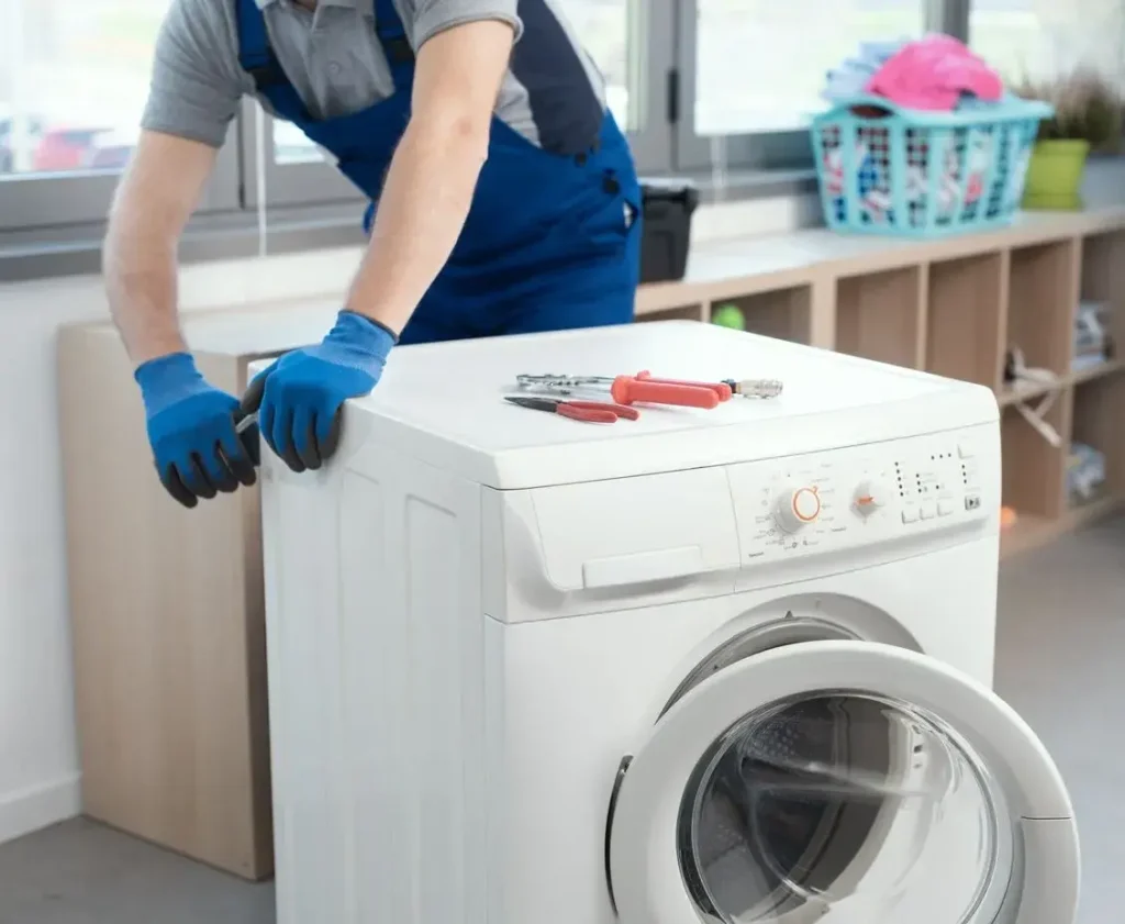Local appliance fixing technician repairing an appliance in Philadelphia PA