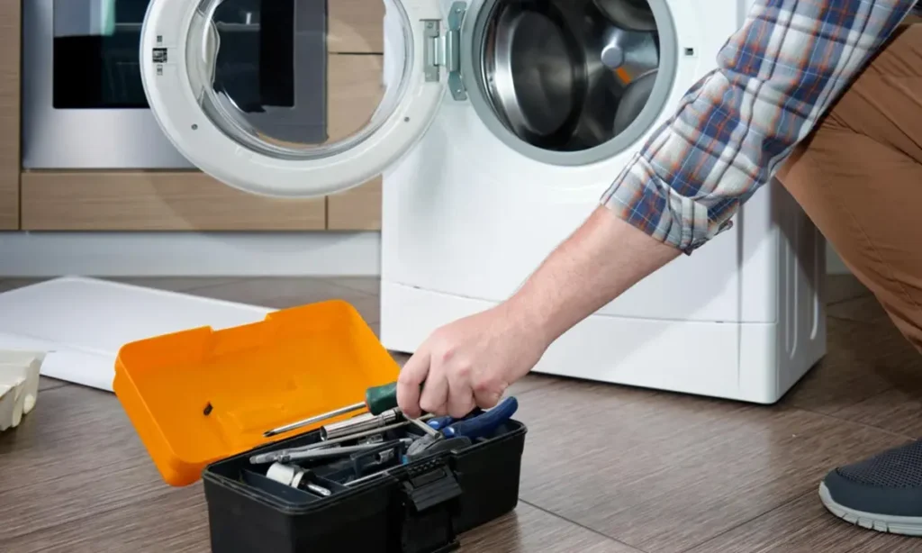 Appliance technician fixing a home appliance in Philadelphia PA
